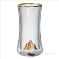 double wall tea cup with gold rim